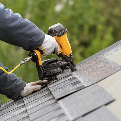 Storm restoration roofing services Conroe